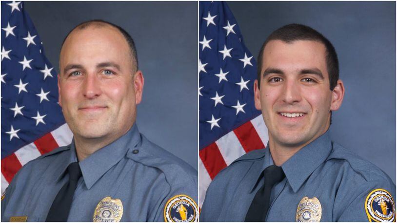 Now-former Gwinnett County police Sgt. Michael Bongiovanni and Master Police Officer Robert McDonald. (Credit: Gwinnett County Police Department)