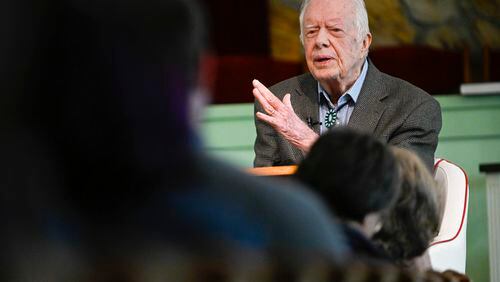 In this Nov. 3, 2019, file photo, former President Jimmy Carter teaches Sunday school at Maranatha Baptist Church, in Plains, Ga. Former President Carter called Wednesday, June 3, 2020, for Americans in positions of power and influence to fight racial injustice, saying “silence can be as deadly as violence.”