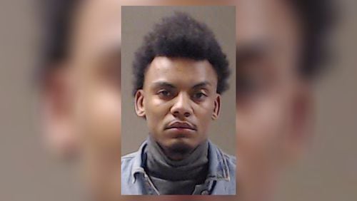 Quincy Tyler Walker, 26, of McDonough, was arrested Sunday at a Buford Highway restaurant.