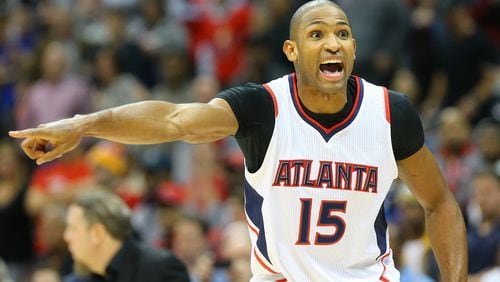 020615 ATLANTA: Hawks center Al Horford reacts to being called for a technical foul for arguing an offensive foul call against him for knocking Warriors forward Draymond Green to the hardwood on his way to the basket in a basketball game on Friday, Feb 6, 2015, in Atlanta. The Hawks beat the Warriors 124-116. Curtis Compton / ccompton@ajc.com