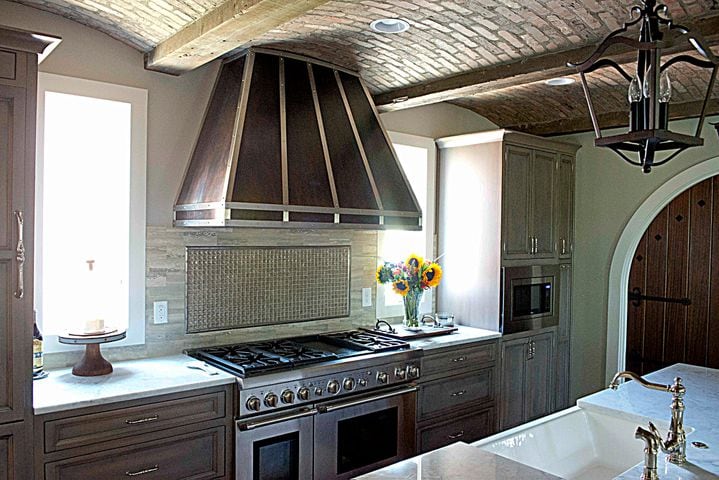 Hand-sanded stainless steel hood oxidized with acid wash