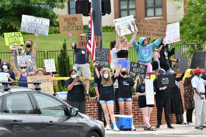 Protesters demonstrate outside the Forsyth County Courthouse in Cumming during a peaceful protest for unity and equality in honor of George Floyd, Black Lives Matter and encouraging community policing and accountability on Saturday, June 6, 2020. (Photo: Hyosub Shin / Hyosub.Shin@ajc.com)