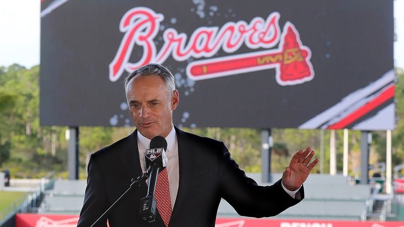 Baseball  ommissioner Rob Manfred takes questions about the Houston Astros during a news conference at the Atlanta Braves' spring training facility on Sunday, Feb. 16, 2020, in North Port, Fla.