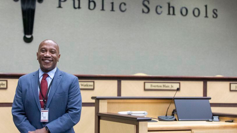 Calvin Watts poses for a photo after being appointed Gwinnett County's superintendent in July 2021. One group is questioning his membership on a board that reviews the district's accreditation. (Rebecca Wright for The Atlanta Journal-Constitution)