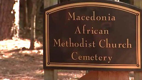 Johns Creek has agreed to take over maintenance of Macedonia Cemetery, a burial ground for former slaves on Medlock Bridge Road. WSB PHOTO