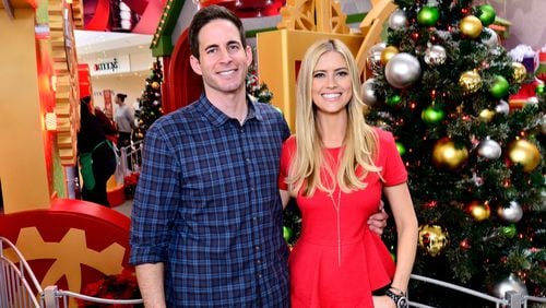 LAKEWOOD, CA - DECEMBER 13: Tarek and Christina El Moussa, hosts of HGTV's hit show Flip or Flop, visited the HGTV Santa HQ at Lakewood Center. The reality stars visited with Santa, toured the new digital Santa headquarters and celebrated the holidays with fans on December 13, 2014 in Lakewood, California. (Photo by Jerod Harris/Getty Images for Lakewood Center)