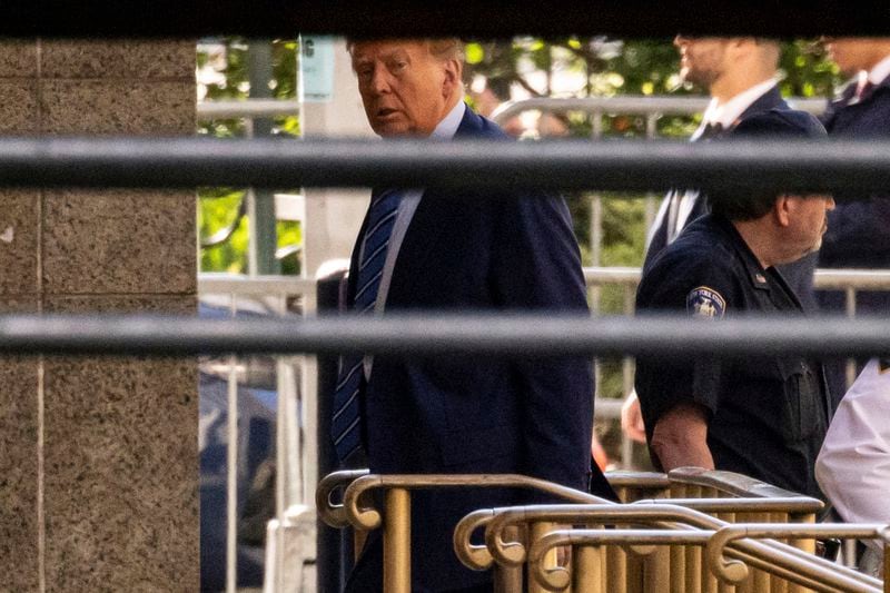 Former President Donald Trump arrives at Manhattan criminal court, Tuesday, April 16, 2024, in New York. Trump is set to return to court as a judge works to find a panel of jurors who'll decide whether the former president is guilty of criminal charges alleging he falsified business records to cover up a sex scandal during the 2016 campaign. (AP Photo/Yuki Iwamura)