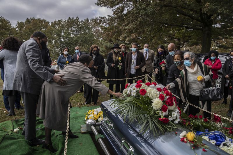 Family and friends attend a funeral service for Al Howard, who once helped save the life of Martin Luther King Jr. as a young NYPD officer, at Greenwood Cemetery in Brooklyn. Howard, who later owned the popular Showman’s Jazz Club in Harlem, died at age 93 of coronavirus complications.