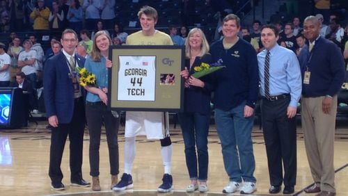 Former Georgia Tech center Ben Lammers with his family, athletic director Todd Stansbury, coach Josh Pastner and associate AD Marvin Lewis on senior day on March 3, 2018, at McCamish Pavilion. (AJC photo by Ken Sugiura)
