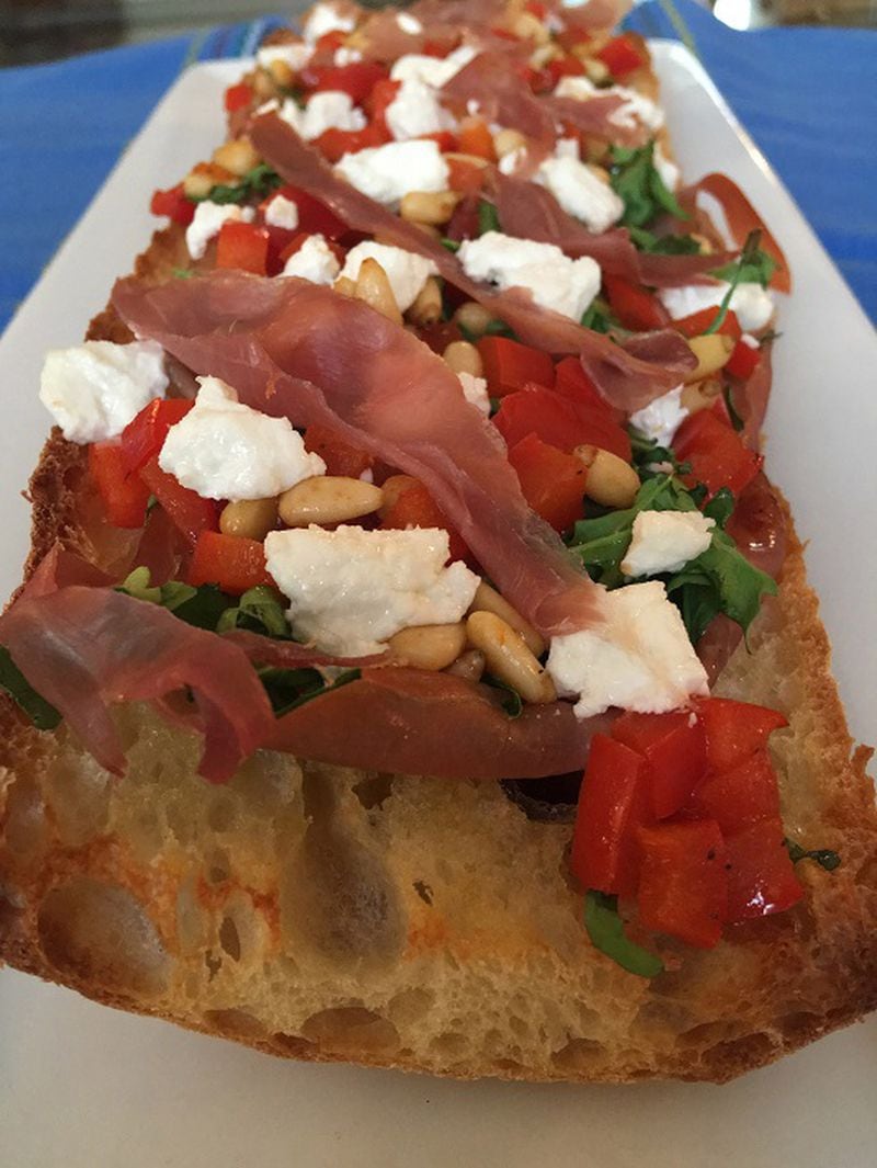 Goat cheese, red pepper, pine nut and prosciutto pizza on toasted ciabatta.(Karen Kane/ Pittsburgh Post-Gazette/TNS)