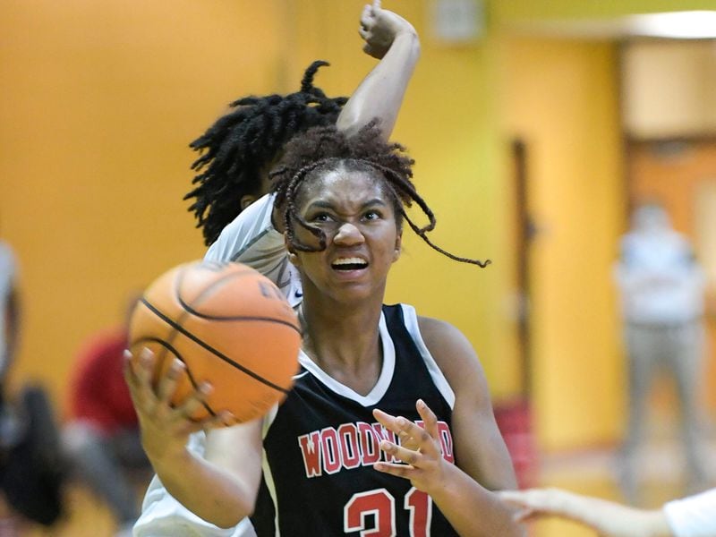 Woodward’s Sydney Bowles (31) drives to the basket during a Class 5A state quarterfinal game Tuesday, March 2, 2021, at Southwest DeKalb High School in Decatur. (Daniel Varnado/For the AJC)