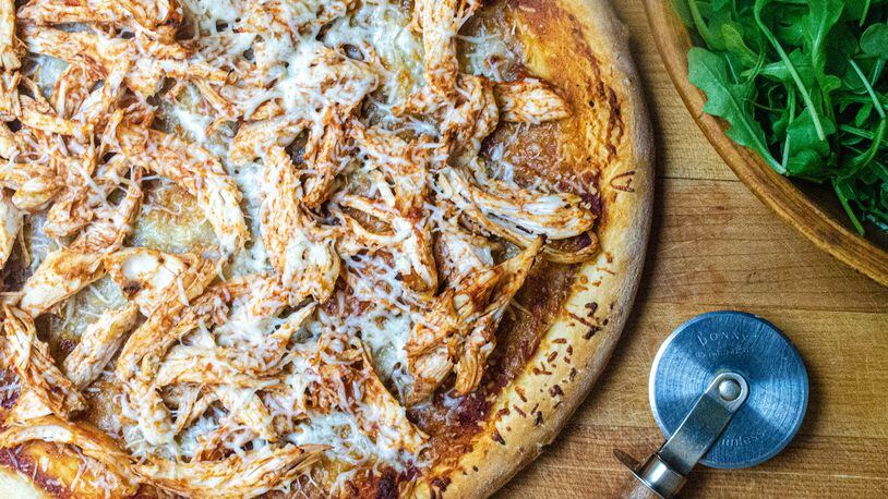Barbecue Chicken Pizza with an arugula side salad.
(Virginia Willis for The Atlanta Journal-Constitution)
