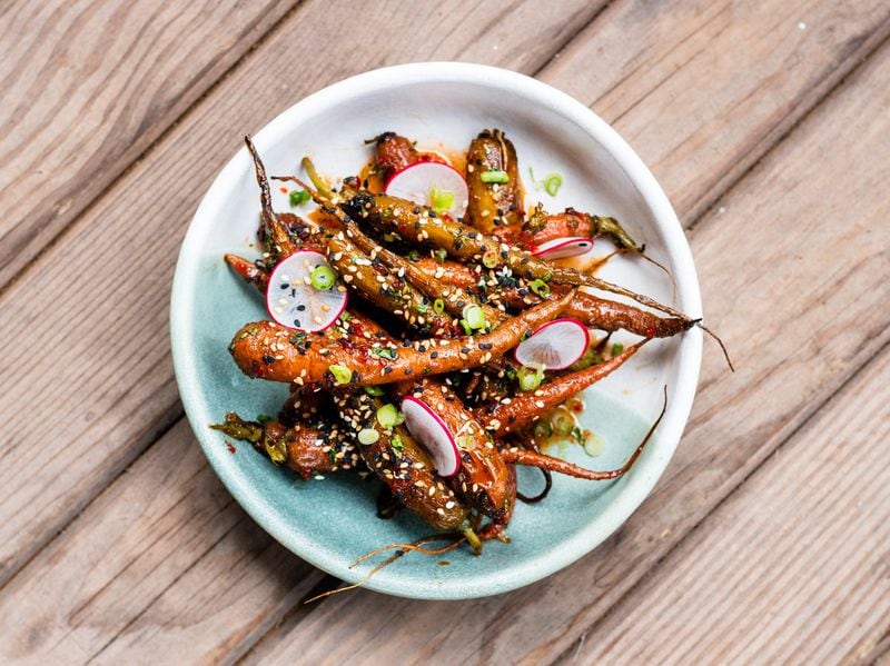 Roasted carrots at Holmes “felt original, and yet wholly familiar and soul satisfying,” our dining critic Ligaya Figueras says. CONTRIBUTED BY HENRI HOLLIS