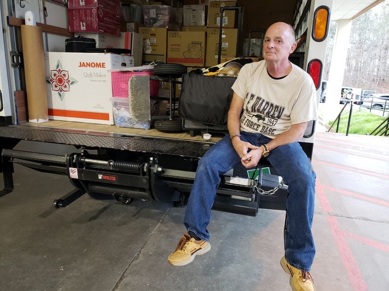 Marc Briley, the third-generation owner of Kennesaw-based Ashby Sewing Machine Company, had to clear out early from a quilting and sewing expo in Gwinnett County. The event ended early as coronavirus concerns grew. If he has to temporarily close his shop, Briley said he intends to still pay his hourly workers for an additional month. MATT KEMPNER / AJC