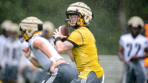 Kennesaw State quarterback Chandler Burks looks for an open receiver in one of the Owls' first camp practices ahead of the 2018 football season.