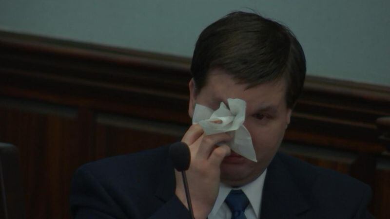 Justin Ross Harris becomes emotional during the opening statement by his lawyer Maddox Kilgore at Harris' murder trial at the Glynn County Courthouse in Brunswick, Ga., Monday, Oct. 4, 2016. (screen capture via WSBTV)