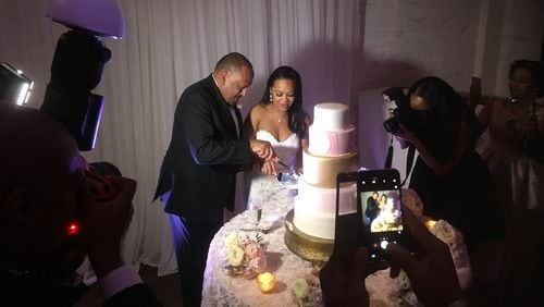 Frank Ski and Dr. Patrice Basanta-Henry cut their wedding cake at The Estate. Photos and videos: Jennifer Brett