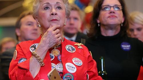 November 8, 2016, ATLANTA: Phyllis Slaght and other Georgia voters remain glued to the screen watching presidential returns at the Republican Watch party at the Grand Hyatt, Buckhead, on Tuesday, Nov. 7, 2016, in Atlanta. Curtis Compton /ccompton@ajc.com