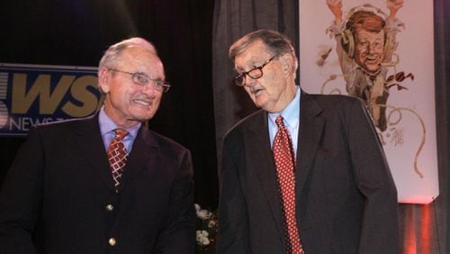 Broadcaster Larry Munson (right) with former Georgia coach Vince Dooley in 2006. (File photo/John Amis)