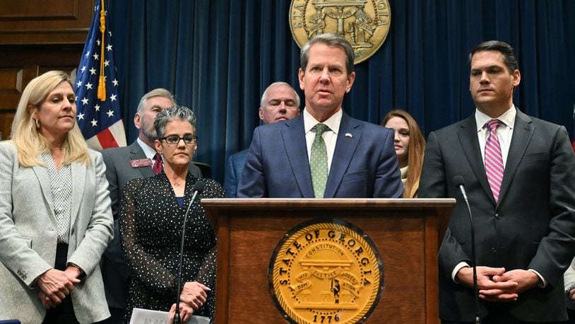 Gov. Brian Kemp, shown speaking at a press conference where he announced legislative measures he’s proposing to combat human trafficking, is taking a hard-nosed approach to crime in the state. His proposed budget would also reduce funding for Georgia’s public defender system and the state’s accountability courts, which steer nonviolent offenders away from prison. Some have expressed concern that Kemp’s efforts could unravel the criminal justice overhaul Nathan Deal directed when he was governor. But others say Kemp’s work complements Deal’s accomplishments. (Hyosub Shin / Hyosub.Shin@ajc.com)