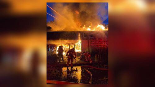 The fire gutted an abandoned building at the edge of the Toco Hills shopping center on North Druid Hills Road.