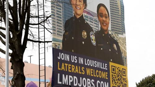 The image of former Atlanta police chief Erika Shields and current chief of police of the Louisville Metro Police Department is seen on a billboard recruiting police officers down the street from police headquarters In Atlanta on Tuesday, March 15, 2022. (Bob Andres / robert.andres@ajc.com)