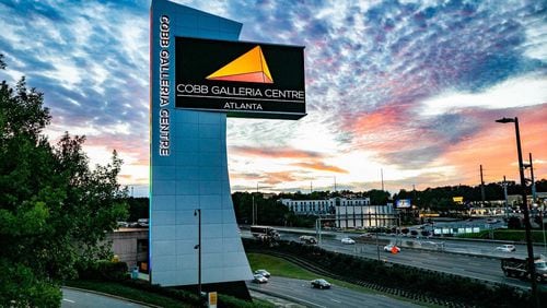 This is the new Cobb Galleria Centre marquee that now stands over I-285 near SunTrust Park. The sign was lit the night of Wednesday, Oct. 17, 2018.