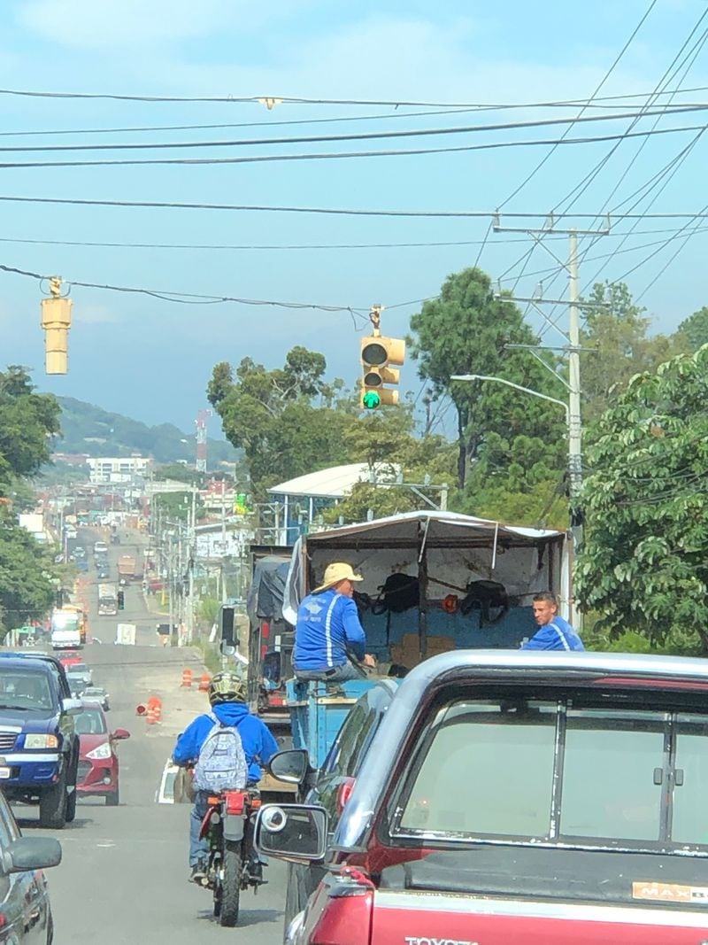 This is a traffic signal just outside of downtown San Jose, Costa Rica. Some green lights at big intersections in the city have timers before they turn yellow.