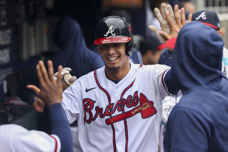 Atlanta Braves’ Vaughn Grissom celebrates with teammates in the dugout after scoring a run during the fifth inning against the Miami Marlins at Truist Park, Thursday, April 27, 2023, in Atlanta. The Braves lost to the Marlins 5-4. Jason Getz / Jason.Getz@ajc.com)