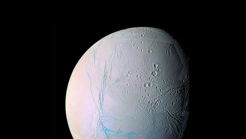This photo of Saturn’s moon Enceladus, taken by the Cassini spacecraft, shows the cracks in the icy surface. Cassini detected some of the chemical elements needed for life in plumes of gas and particles erupting from the moon’s surface.