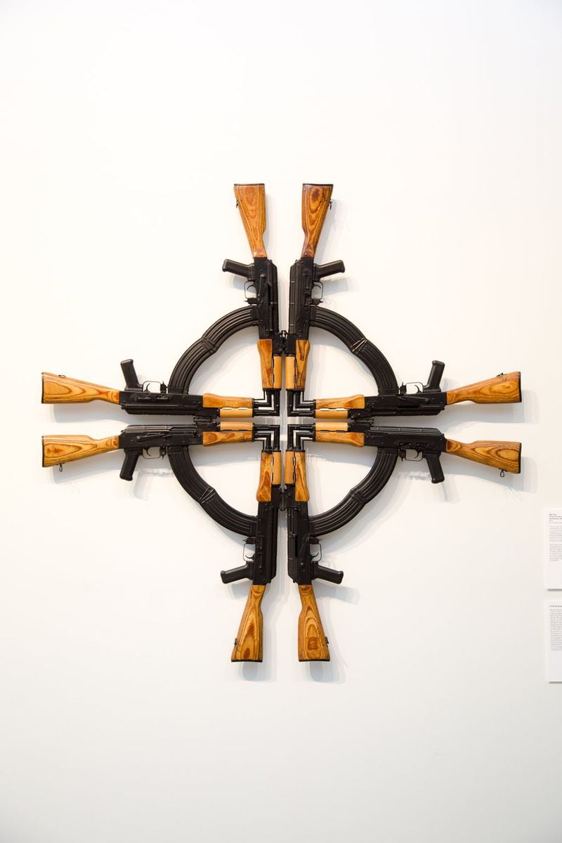 “Cross for the Unforgiven” by Mel Chin features cut and welded AK-47 assault rifles. CONTRIBUTED BY THE ARTIST AND DASHBOARD