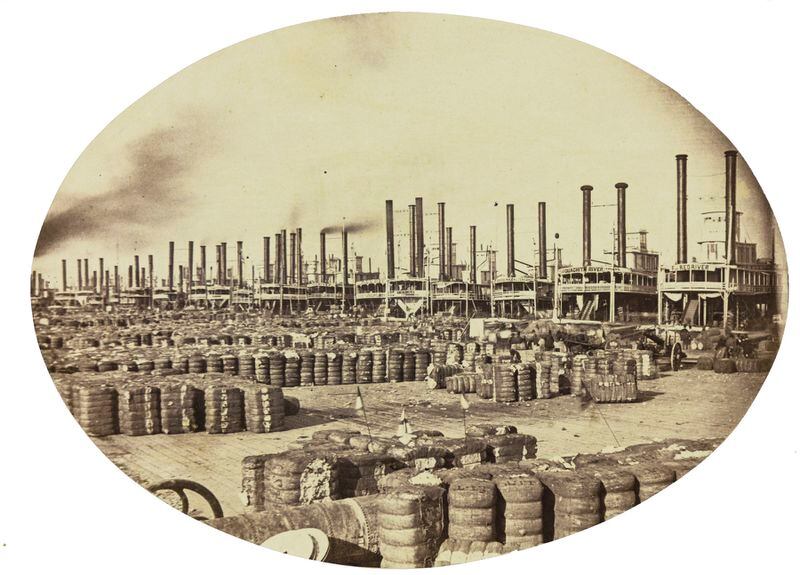 This photograph provided by the New Orleans Museum of Art, is a coated salt print of New Orleans cotton wharves sometime between 1858 and 1861 by Jay Dearborn Edwards. It is among 19th century landscape photographs in an exhibit to be shown at the museum from Oct. 6-Jan. 7, including some of the earliest photographs taken in this country. (New Orleans Museum of Art via AP)