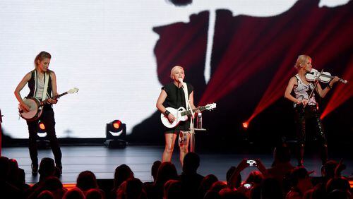 Emily Strayer, Natalie Maines, and Martie Maguire of the Dixie Chicks perform onstage during the DCX World Tour MMXVI Opener on June 1, 2016 in Cincinnati, Ohio. The band did not allow photographers at the Atlanta concert. (Photo by Kevin Mazur/Getty Images for PMK)
