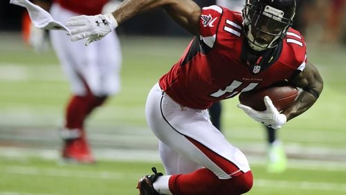 Atlanta Falcons wide receiver Julio Jones  was ranked the second-best receiver in breaking routes in 2016 behind the Baltimore Ravens Mike Wallace, according to Pro Football Focus. Curtis Compton/ccompton@ajc.com