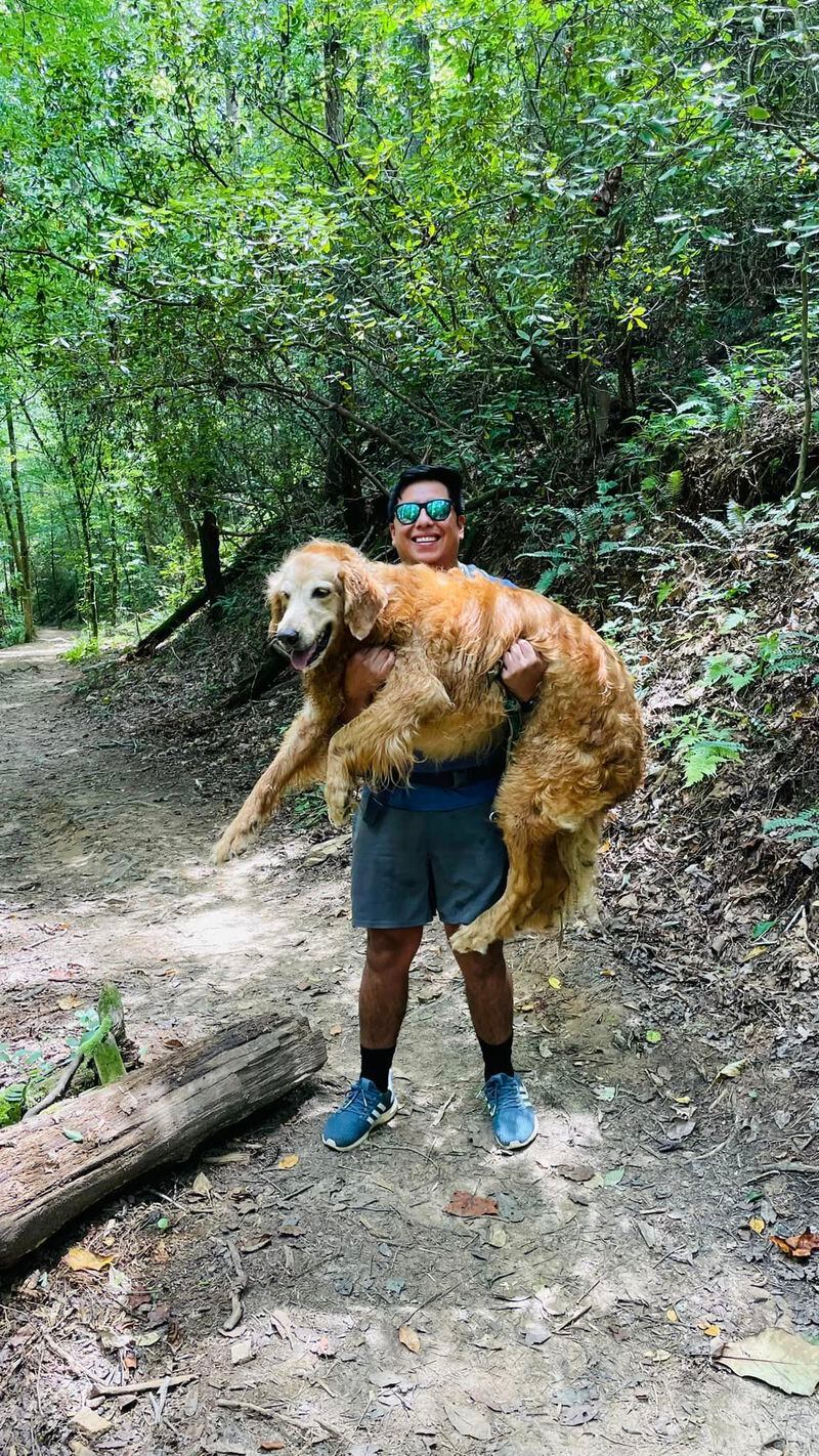 Bryan Santana tried to carry Prince down the mountain himself, but the 100-pound dog was too heavy. Courtesy of Cheryl Hite