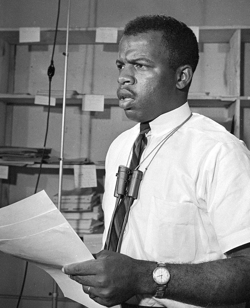 John Lewis, chairman of the Student Nonviolent Coordinating Committee, speaks at a news conference in Jackson, Miss., June 23, 1964. He called on President Johnson to protect summer volunteers in Mississippi and said that civil rights workers face harrassment, arrests and outright violence in the state. (AP Photo/Jim Bourdier)