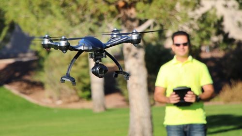 Camera drone flying at a park. (Dreamstime/TNS)