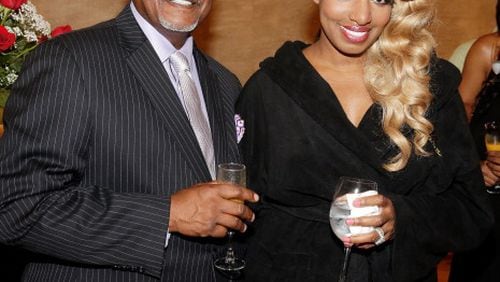 LAS VEGAS, NV - JUNE 27: Actress NeNe Leakes (R) and her husband Gregg Leakes attend a perforamnce of 'ZUMANITY, The Sensual Side of Cirque du Soleil' at the New York-New York Hotel & Casino on June 27, 2014 in Las Vegas, Nevada. (Photo by Isaac Brekken/Getty Images for Cirque du Soleil) LAS VEGAS, NV - JUNE 27: Actress NeNe Leakes (R) and her husband Gregg Leakes attend a perforamnce of 'ZUMANITY, The Sensual Side of Cirque du Soleil' at the New York-New York Hotel & Casino on June 27, 2014 in Las Vegas, Nevada. (Photo by Isaac Brekken/Getty Images for Cirque du Soleil)