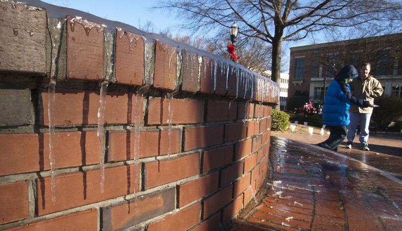 Dec. 22, 2012: As the wind howled Friday night over Marietta Square, visitors awoke Saturday morning, Dec. 22, to a layer of ice and icicles near the fountain.