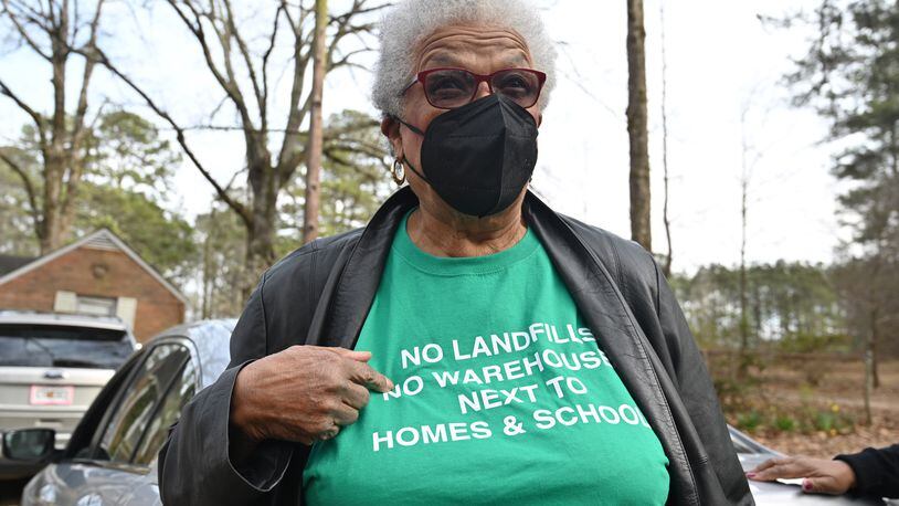 Former City of South Fulton Councilwoman Naeema Gilyard wearing a t-shirt discusses about an illegal landfill and raising concerns about air pollution levels, Friday, Feb. 10, 2023, in Fairburn. For years, former City of South Fulton Councilwoman Naeema Gilyard and other neighbors have been concerned about breathing smoke from the landfill, not to mention emissions from the steady stream of diesel big rigs that coming and going from warehouses that line South Fulton Parkway. Even with modern engines and cleaner fuel, exhaust from diesel trucks is known to contain a dangerous cocktail of air pollutants. (Hyosub Shin / Hyosub.Shin@ajc.com)