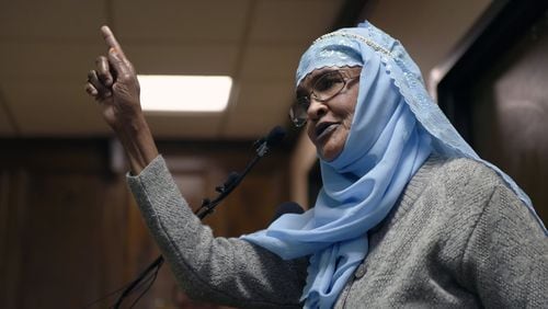 January 31, 2017, Clarkston - Amina Osman, with the International Community Outreach & Information Services, speaks at the podium during a special session of the Clarkston City Council in Clarkston, Georgia, on Tuesday, January 31, 2017. The session is taking place to discuss president Donald Trump’s recent executive orders and how the city of Clarkston plans to respond. (DAVID BARNES / DAVID.BARNES@AJC.COM)