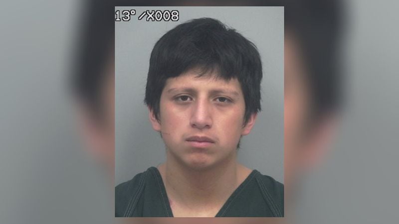 Erik Ruiz Lopez was arrested in connection with the death of a man inside a Gwinnett home early Wednesday, police said.