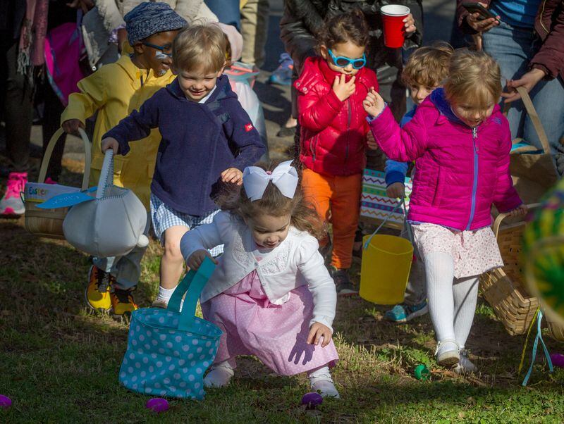 Kids scramble to find eggs during the Eggstravaganza Easter Egg Hunt at Callanwolde Fine Art Center Saturday, March 31, 2018.  STEVE SCHAEFER / SPECIAL TO THE AJC