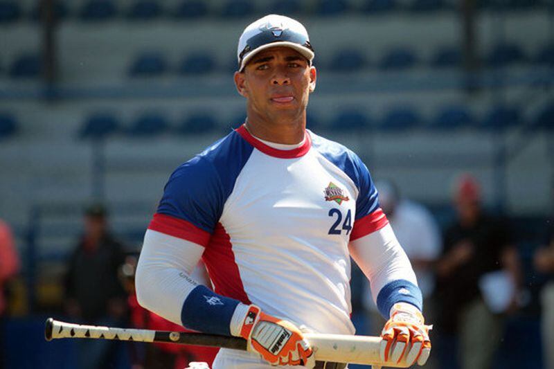 The Braves are counting down the days till the arrival of Hector Olivera, the 30-year-old Cuban who could be in their lineup in another week or so. (AP Photo)