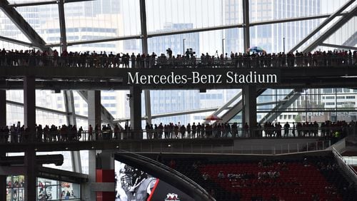 Two sky-bridges proved a popular place to watch the game during Mercedes-Benz Stadium’s opener Saturday.