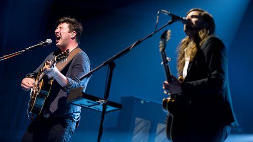 Marcus Mumford, left, and Winston Marshall of Mumford & Sons perform at the Infinite Energy Center, Monday, April 11, 2016, in Duluth. BRANDEN CAMP/SPECIAL