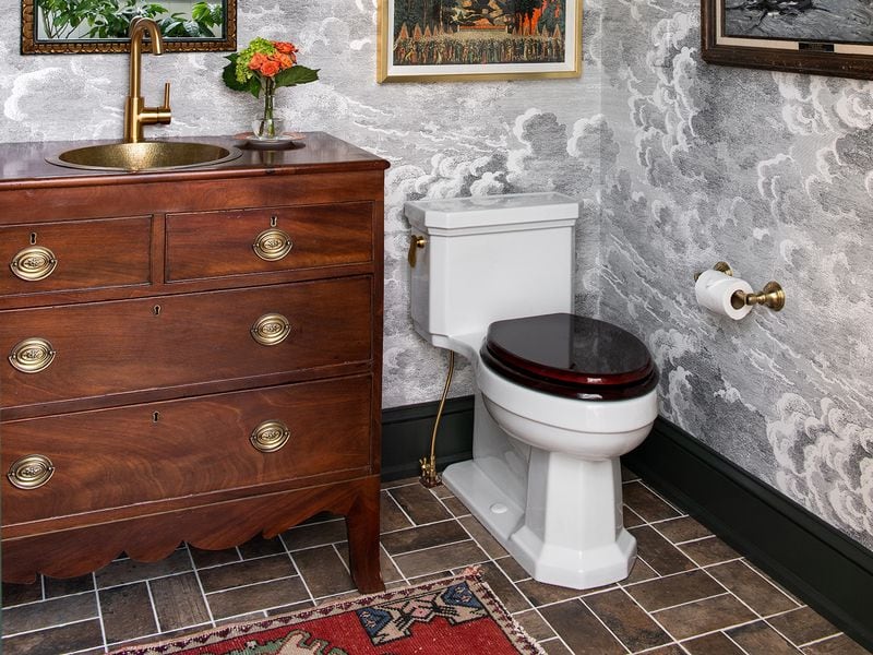 A vintage piece can be converted into a bathroom vanity.
Photo: Courtesy of Isabel Ladd Interiors / Katie Charlotte