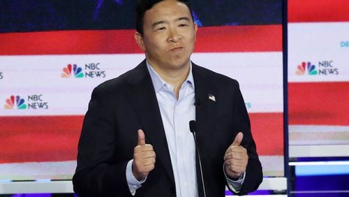 MIAMI, FLORIDA - JUNE 27: Democratic presidential candidate former tech executive Andrew Yang speaks during the second night of the first Democratic presidential debate on June 27, 2019 in Miami, Florida.  A field of 20 Democratic presidential candidates was split into two groups of 10 for the first debate of the 2020 election, taking place over two nights at Knight Concert Hall of the Adrienne Arsht Center for the Performing Arts of Miami-Dade County, hosted by NBC News, MSNBC, and Telemundo. (Photo by Drew Angerer/Getty Images)