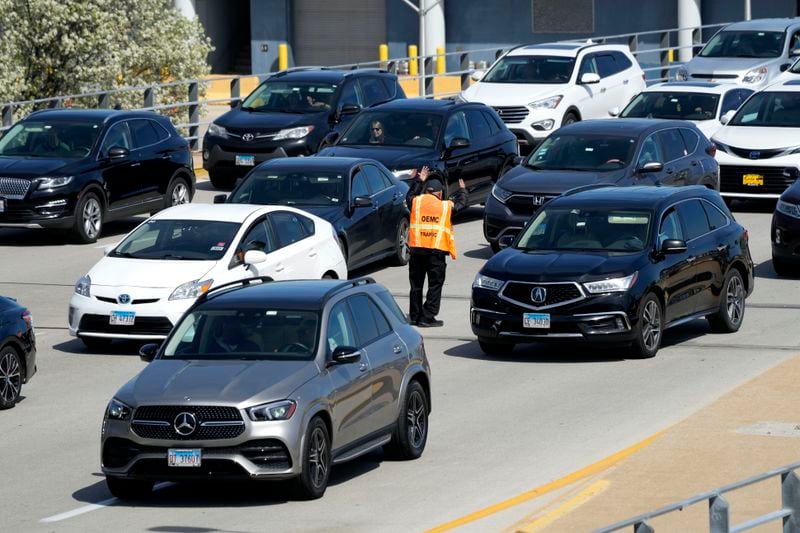 Heavy traffic is seen at O'Hare International Airport in Chicago, Monday, April 15, 2024. Pro-Palestinian demonstrators blocked a freeway leading to three Chicago O'Hare International Airport terminals Monday morning, temporarily stopping vehicle traffic into one of the nation's busiest airports and causing headaches for travelers. (AP Photo/Nam Y. Huh)