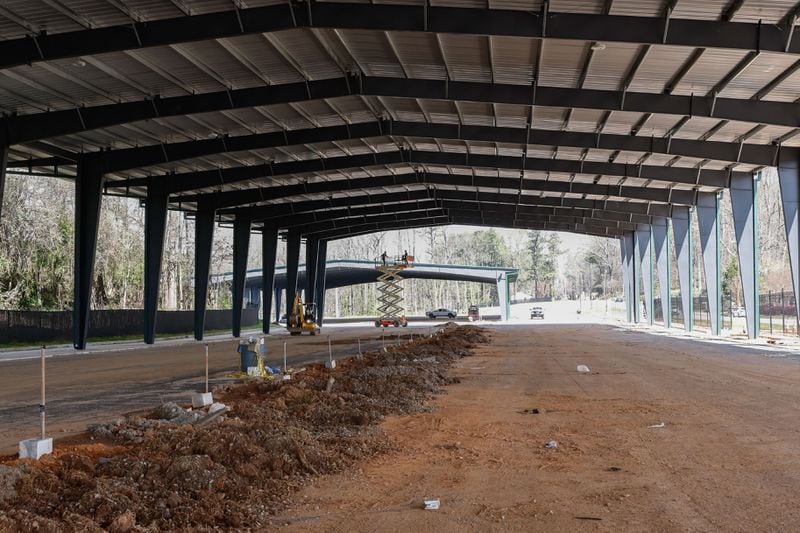 Construction of Peachy Airport Parking's new covered parking facility continues on Wednesday, March 13, 2024. The new lot is set to open by the end of this month with more than 1,000 spaces. (Natrice Miller/ Natrice.miller@ajc.com)